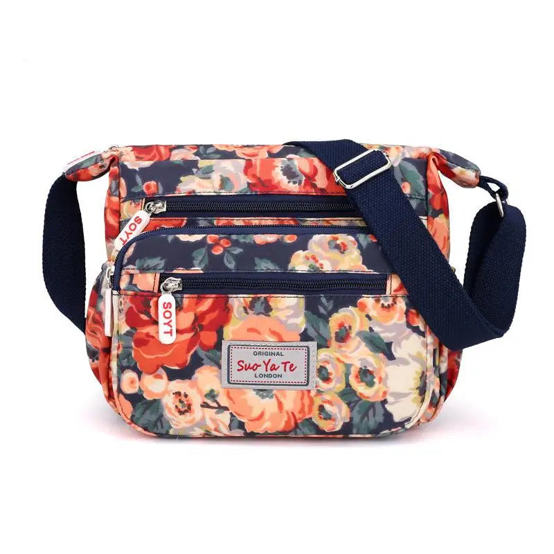 Women’s Floral Multi-Pocket Crossbody Handbag | Waterproof Canvas Shoulder Messenger Bag | Large Capacity Nylon Travel Bag for Hiking & Shopping | Durable Casual Floral Purse (Model 190417065127) Luxegan