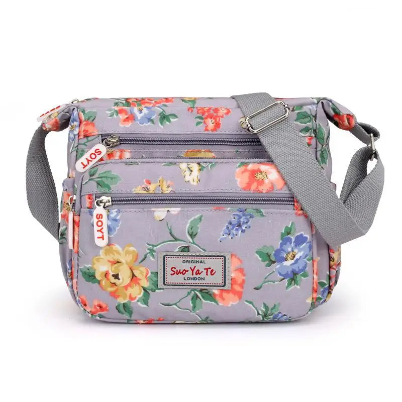 Women’s Floral Multi-Pocket Crossbody Handbag | Waterproof Canvas Shoulder Messenger Bag | Large Capacity Nylon Travel Bag for Hiking & Shopping | Durable Casual Floral Purse (Model 190417065127) Luxegan