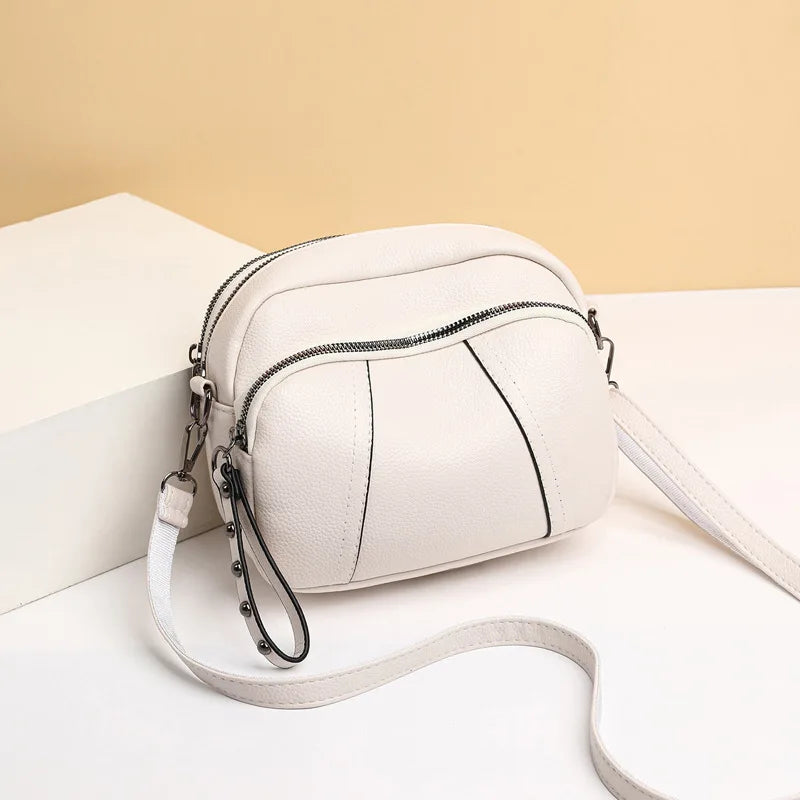 Fashionable Rivet-Accent Mobile Phone Bag | Sophisticated Solid-Color Shell Handbag | Elegant Soft PU Leather Crossbody | "Dignified" Small Square Purse for Versatile Daily Styling Luxegan