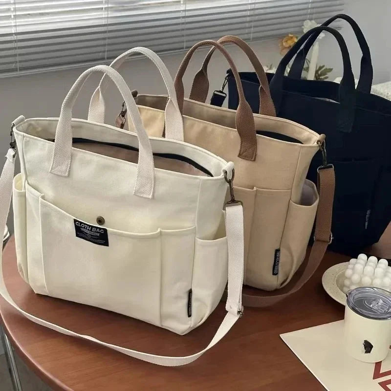 Urban Minimalist Female Student Tote Bag | Sophisticated Large Capacity Commuting Canvas Bag | Elegant Horizontal Single Shoulder & Diagonal Crossbody | Fashion-Forward Portable Portable Canvas Satchel Luxegan