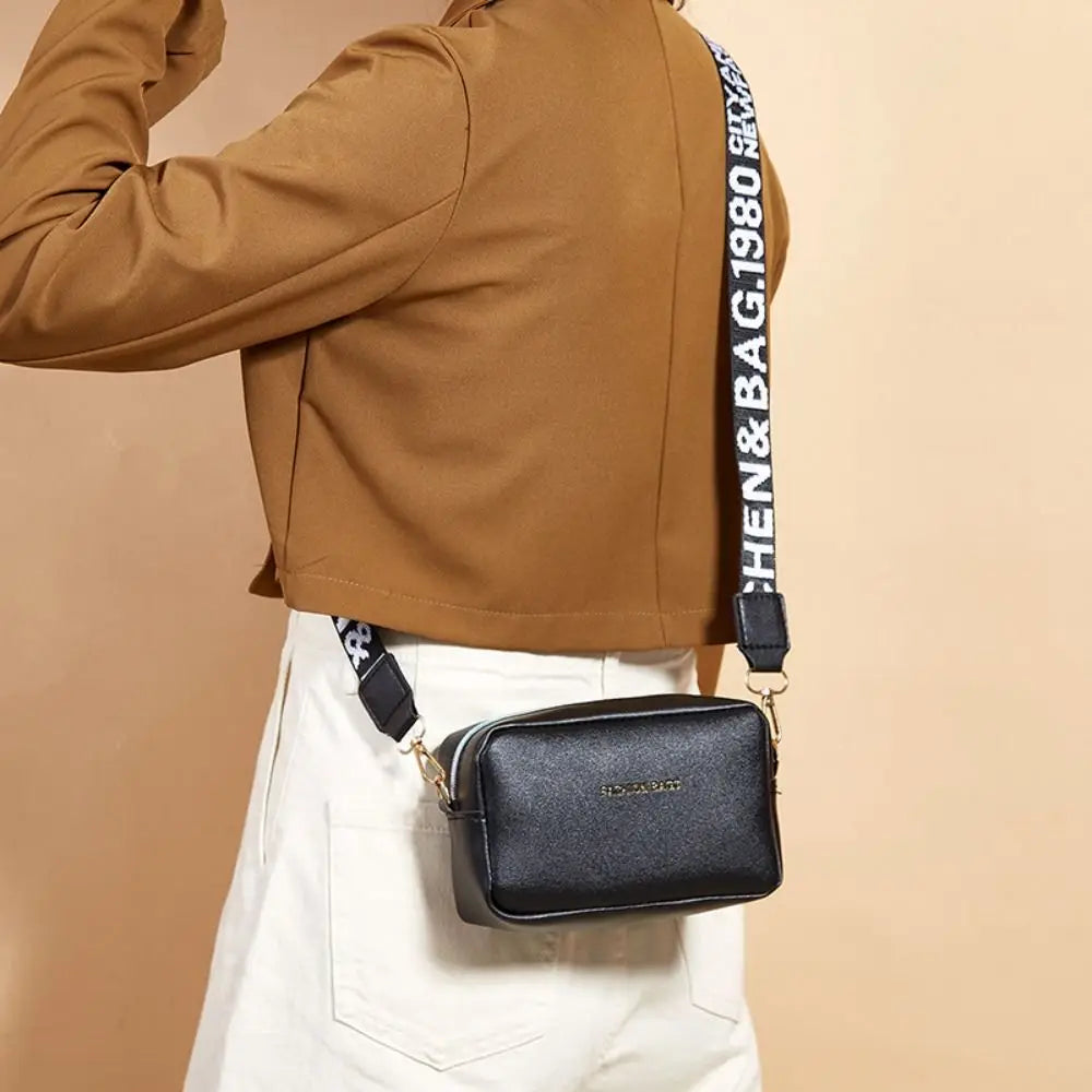 Simple Designer Wide Letter Strap Handbag | Sophisticated PU Leather Square Shoulder Bag | Elegant Small Phone Crossbody Purse | Fashion-Forward Travel Sac for Women & Unisex Styling Luxegan