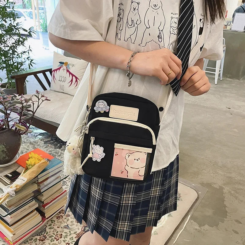 Cute Clear Kawaii Canvas Bag | Harajuku Cartoon Messenger Bag for Girls | Sophisticated Small Patchwork Shoulder Pouch | Fashion-Forward Nylon Cellphone Purse with Silt Pocket Luxegan
