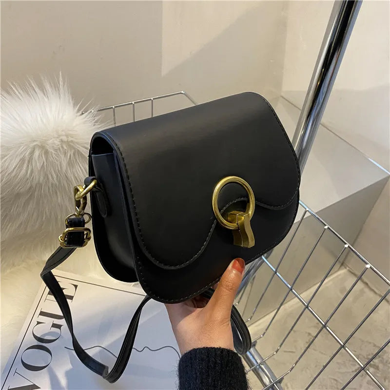 PU Leather Saddle Bag with Fashion Lock | Solid Color Flap Crossbody Purse Luxegan