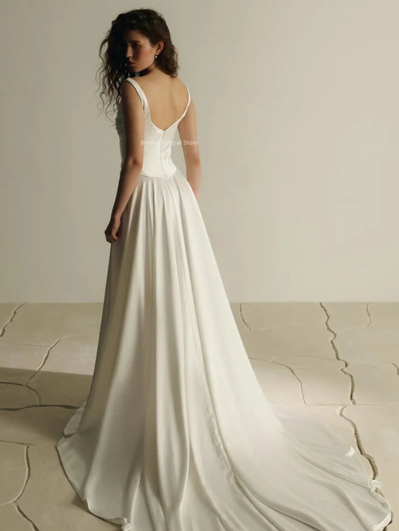 Elegant Lustrous Satin A-Line Wedding Dress | Simple Spaghetti Strap Square Neck Bridal Gown | Classic Pleated Floor-Length Bride Dress | Model M1-250707-10 Custom Lace-Up Gown Luxegan