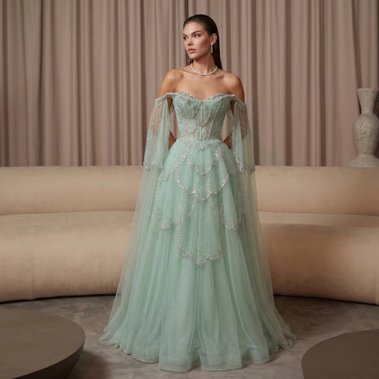 Off-Shoulder Sage Green Evening Gown | Fluid Cape-Sleeve Luxury Gala Dress | Sparkling Crystal Beading Floor-Length A-Line Gown Luxegan