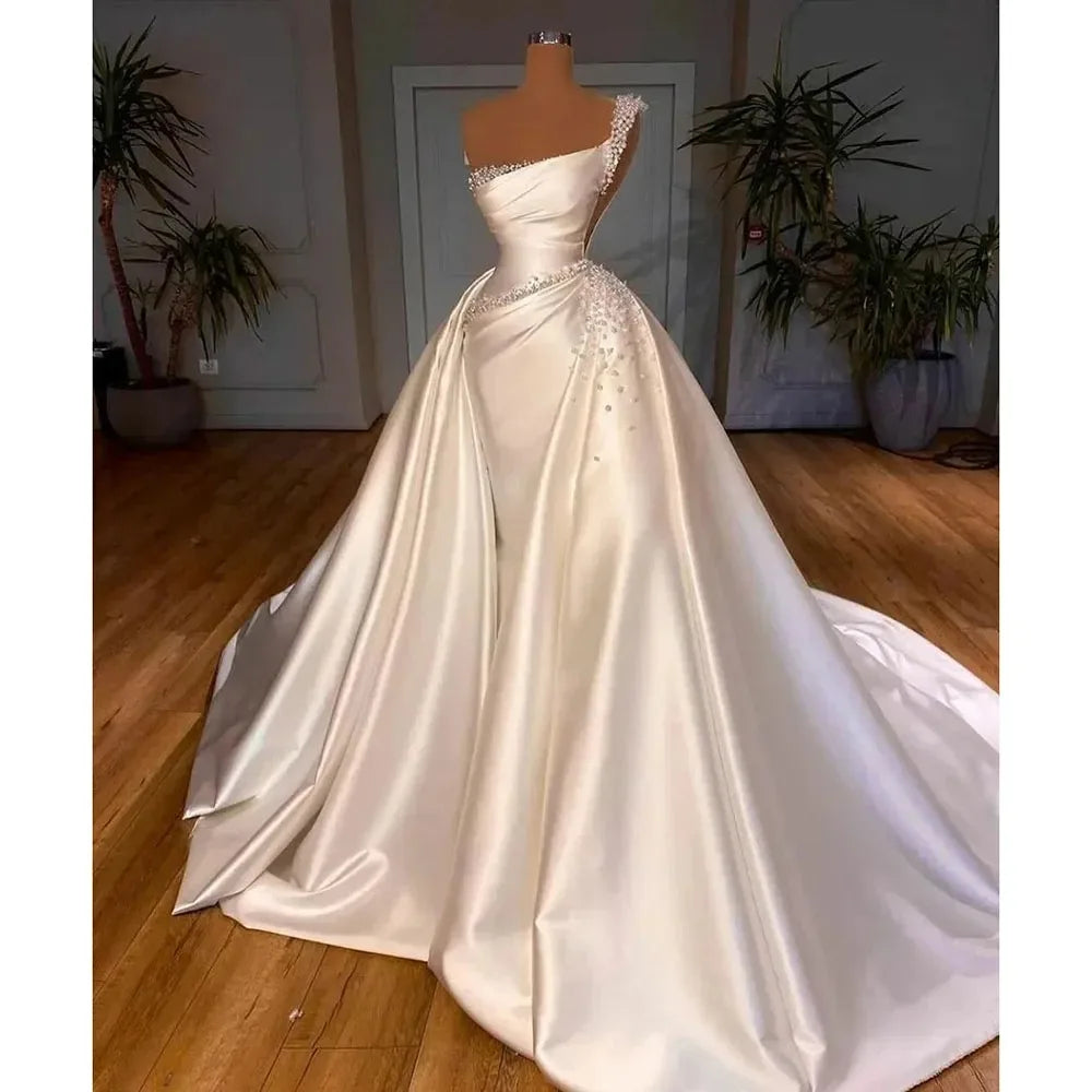 Luxury Satin Pearls Mermaid Wedding Dress | Convertible One-Shoulder Africa Bridal Gown | Bead & Crystal Floor-Length Dress with Detachable Skirt Luxegan