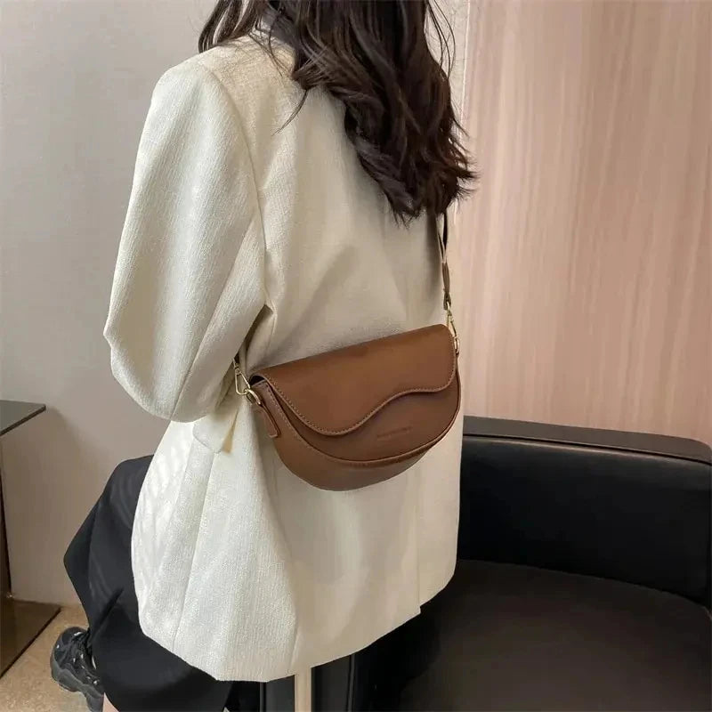 Vintage PU Leather Crossbody Bag | Small Saddle Shoulder Bag with Wide Strap & Flap Design Luxegan