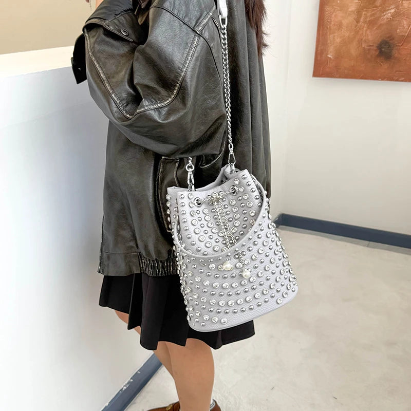 Studded Punk Rock Bucket Bag for Women | Pearl Charm Drawstring Leather Shoulder Bag | Premium Rhinestone Crossbody Purse | Autumn & Winter Solid Color Moderate Hardness Tote Model A Luxegan