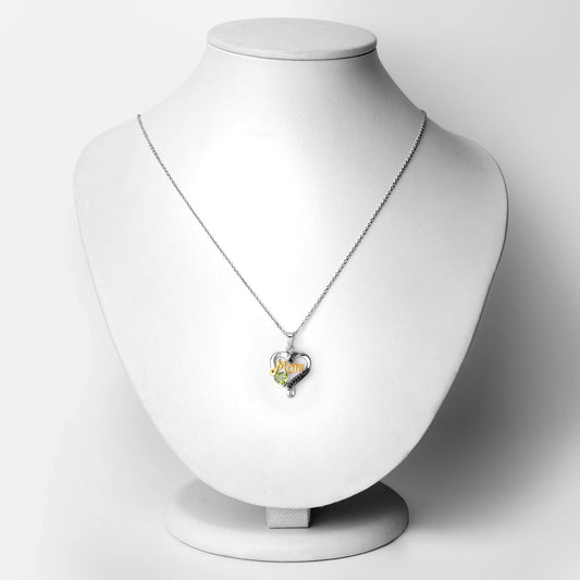 Colgante de plata de ley .925 con peridoto genuino de 0.49 quilates y espinela negra