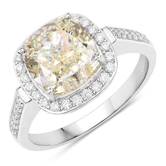 Anillo de oro blanco de 18 quilates con diamante amarillo claro natural de 4,02 quilates certificado por IGI y diamante blanco de 0,36 quilates en total (4,38 quilates en total)