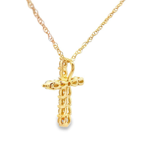 Colgante de cruz religiosa con diamante de .11 ct en oro amarillo de 14 kt