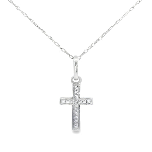Colgante de cruz religioso con diamante de .05 ct en oro blanco de 14 kt