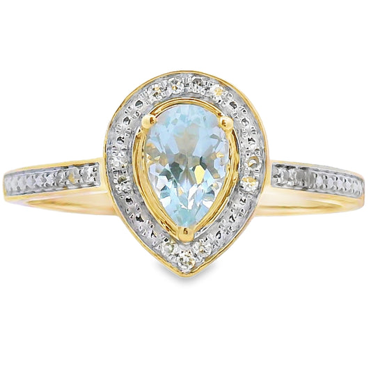 Anillo de aguamarina y diamantes de .39 ct en oro amarillo de 10 kt