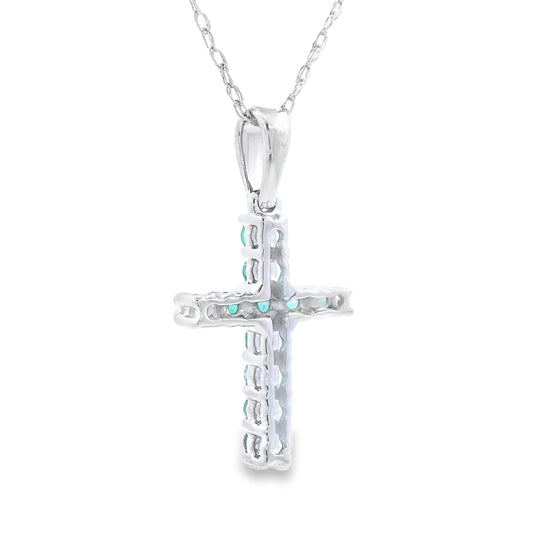 Colgante religioso de cruz con esmeralda de 0,20 ct en oro blanco de 14 K