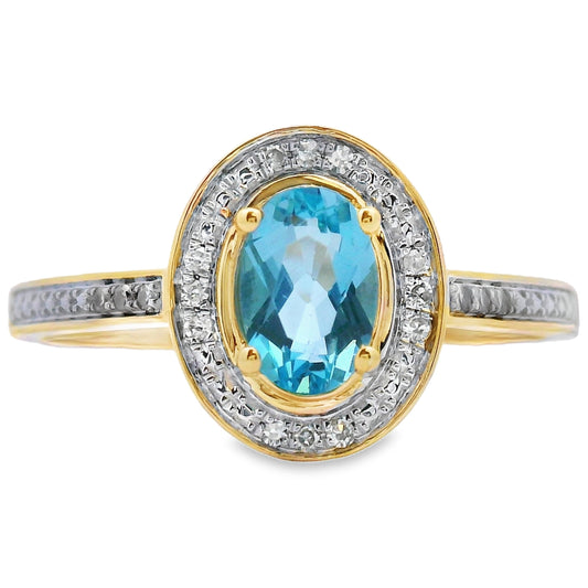 Anillo de topacio azul y diamante de 0,49 qt en oro amarillo de 10 kt