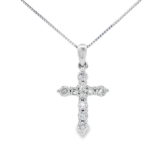 Colgante religioso de cruz con diamante de 0,30 qt en oro blanco de 14 kt