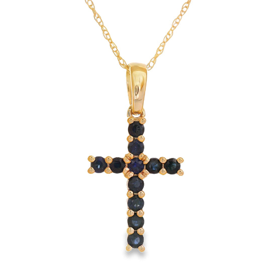 Colgante Religioso Cruz con Zafiro de .29ct en Oro Amarillo de 14kt