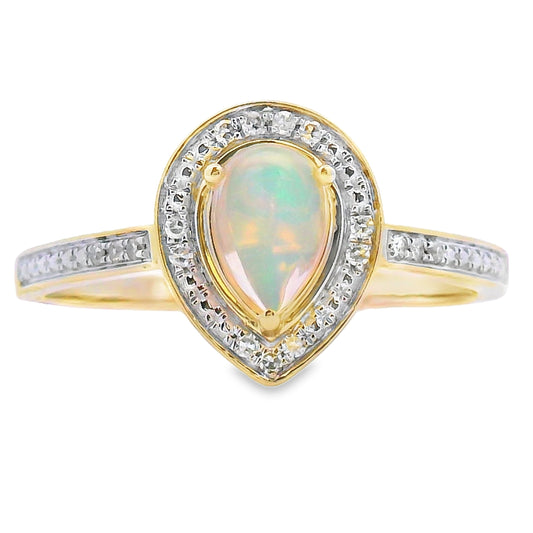 Anillo de ópalo y diamantes de .30 ct en oro amarillo de 10 kt