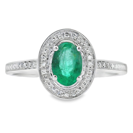Anillo con diamante esmeralda de .49 ct en oro blanco de 10 kt