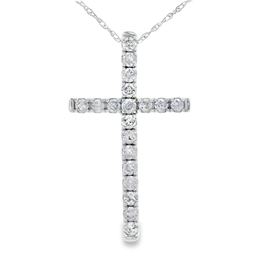 Colgante de cruz religiosa con diamante de .33 ct en oro blanco de 14 kt
