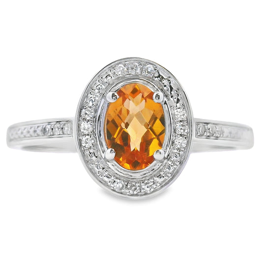 Anillo de citrino y diamante de .47 ct en oro blanco de 10 qt