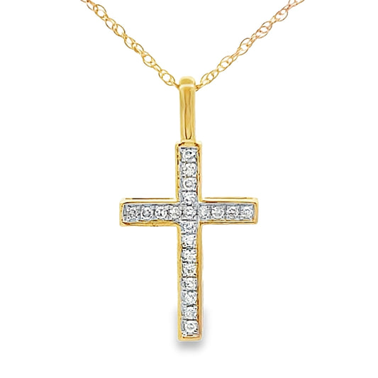 Colgante religioso de cruz con diamante de .07 ct en oro amarillo de 10 kt