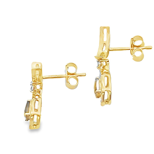 Pendientes colgantes de cuarzo y diamante de .47 ct en oro amarillo de 10 kt