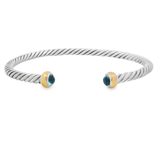 Pulsera de plata de ley de topacio azul con oro de 18 quilates