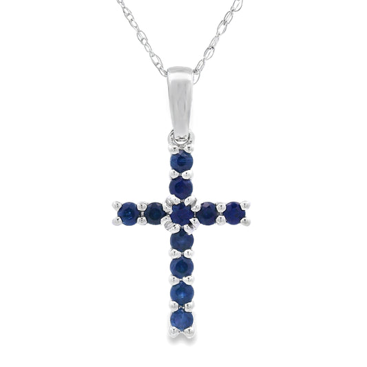 Colgante religioso con cruz de zafiro de .29ct en oro blanco de 14kt