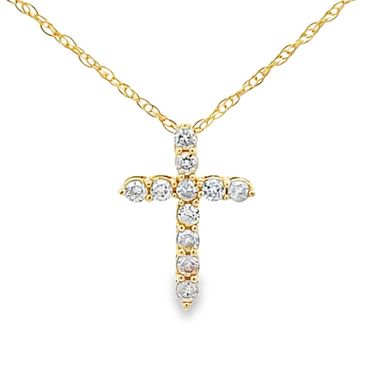 Colgante religioso de cruz con diamante de .12ct en oro amarillo de 14K