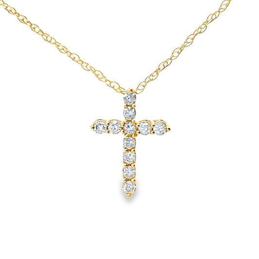 Colgante de cruz religiosa con diamante de .11 ct en oro amarillo de 14 kt