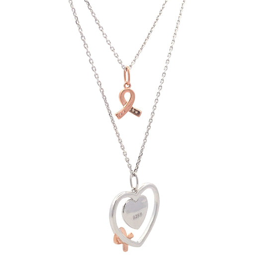 Colgante de corazón de diamantes de .02 ct y plata esterlina