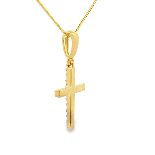 Colgante cruz religiosa con diamante de .08ct en oro amarillo de 10KT