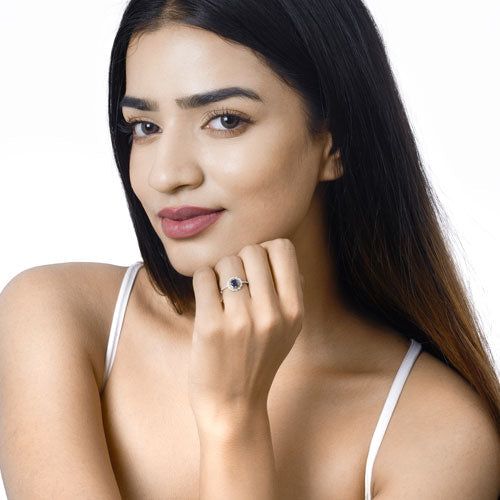 Anillo de oro blanco de 14K con zafiro azul auténtico de 0,78 quilates y diamante blanco