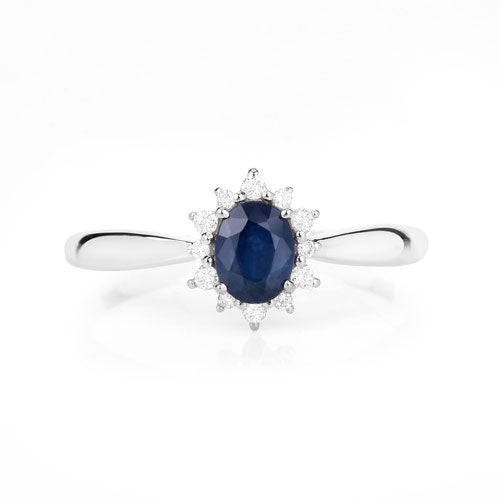 Anillo de oro blanco de 14K con zafiro azul auténtico de 0,44 quilates y diamantes blancos