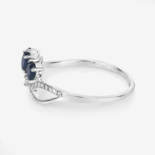 Anillo de oro blanco de 14K con zafiro azul genuino de 0,65 quilates y diamantes blancos