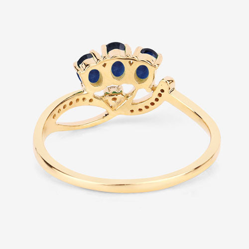 Anillo de oro amarillo de 14K con zafiro azul genuino de 0,65 quilates y diamantes blancos