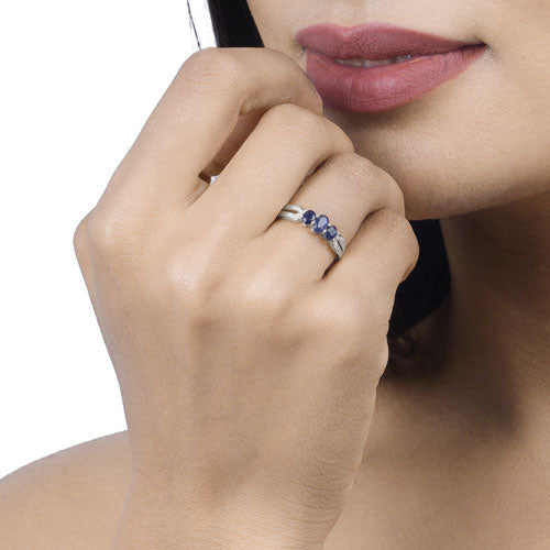 Anillo de 14 quilates de oro blanco con zafiro azul genuino de 0,73 quilates y diamantes blancos