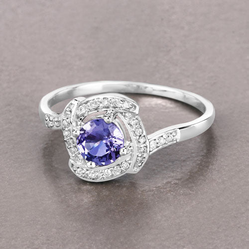 Anillo de oro blanco de 14K con tanzanita genuina de 0.55 quilates y diamantes blancos