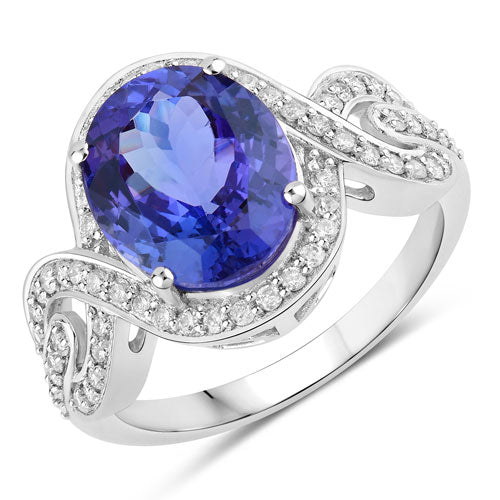 Anillo de oro blanco de 14K con tanzanita auténtica de 4,54 quilates y diamantes blancos